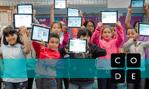 Students holding up final coding projects